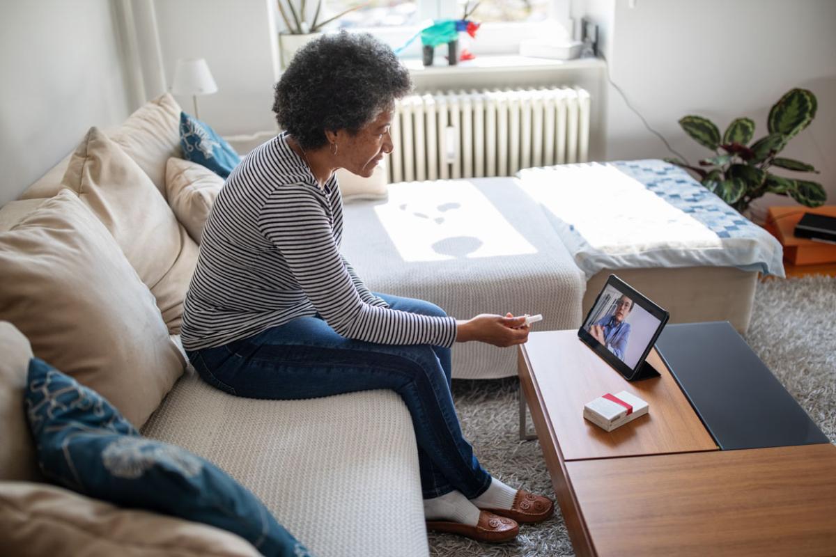 Patient and physician in a telehealth appointment