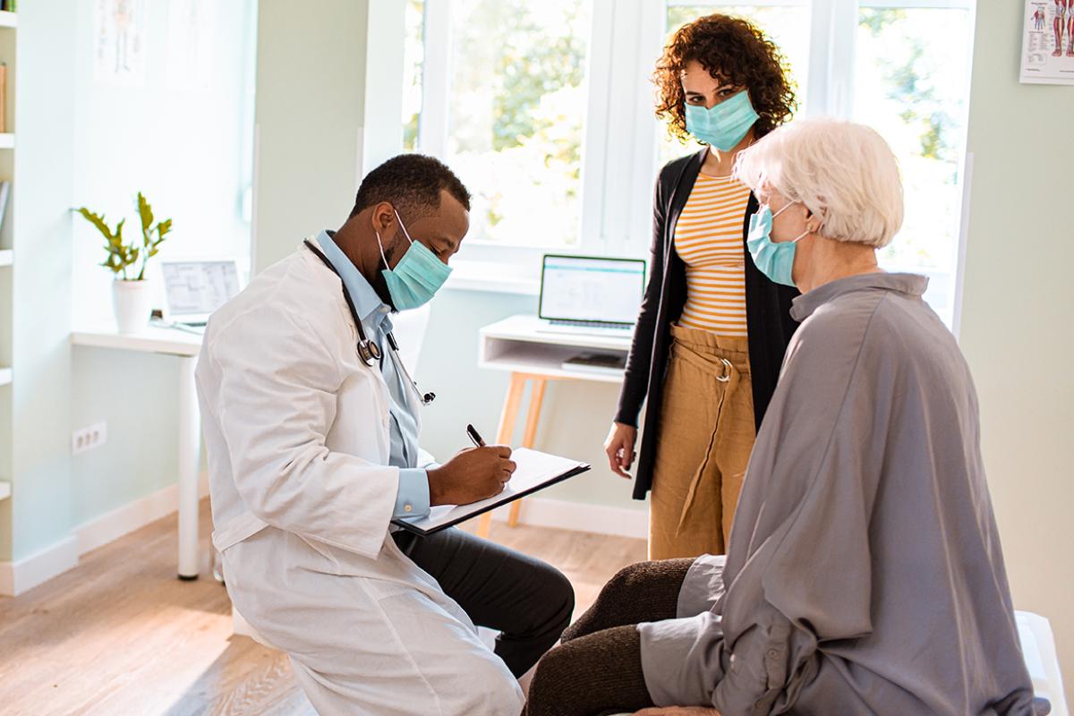 Physician with patient