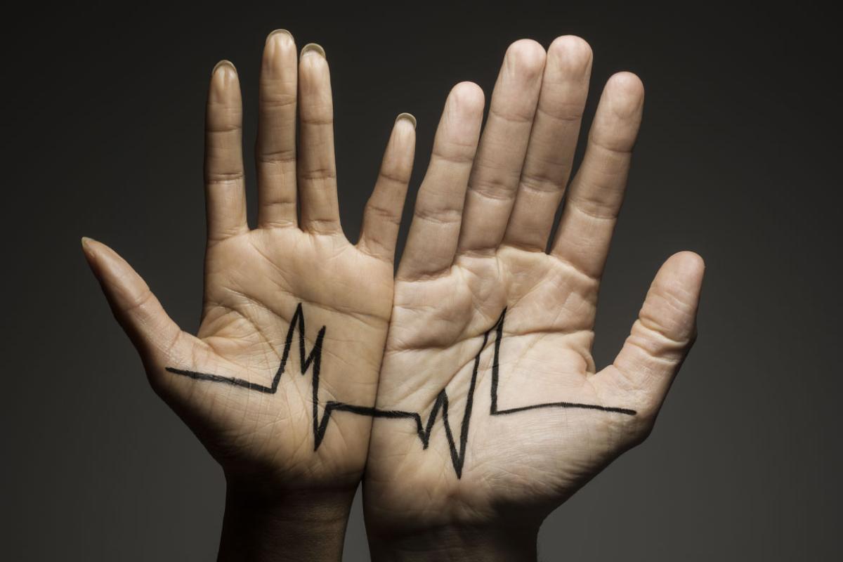Two hands with palms facing forward
