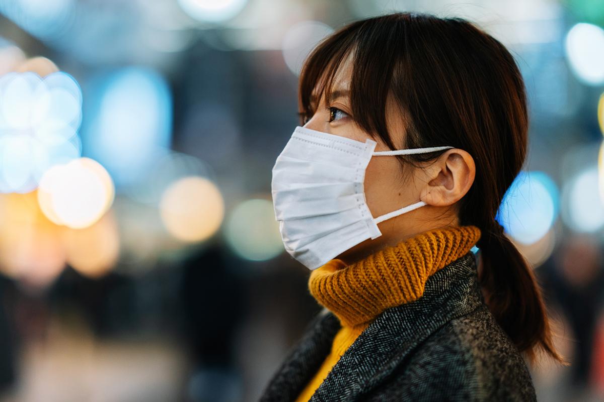 Profile of person in face mask