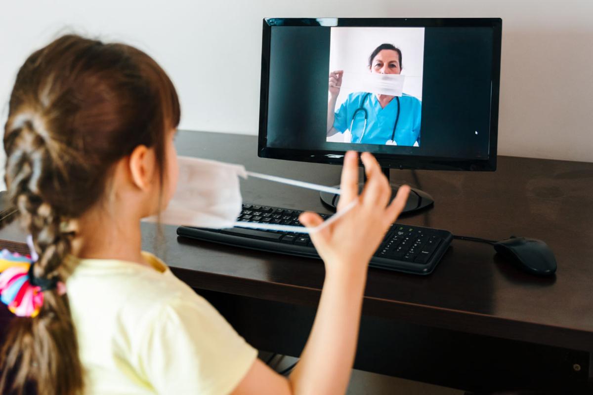 Young child in front of computer