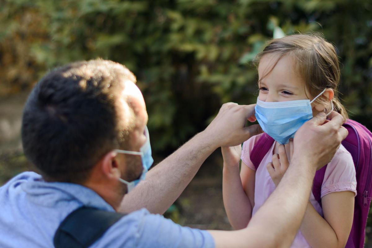 Young child wearing a face mask