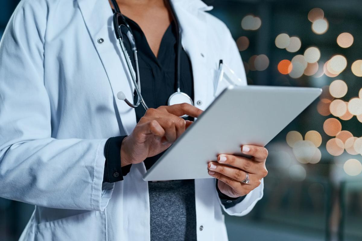 Physician using a tablet
