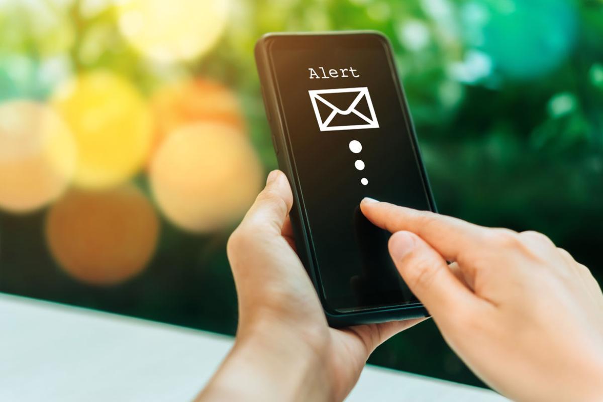 A person's hand on a smart phone
