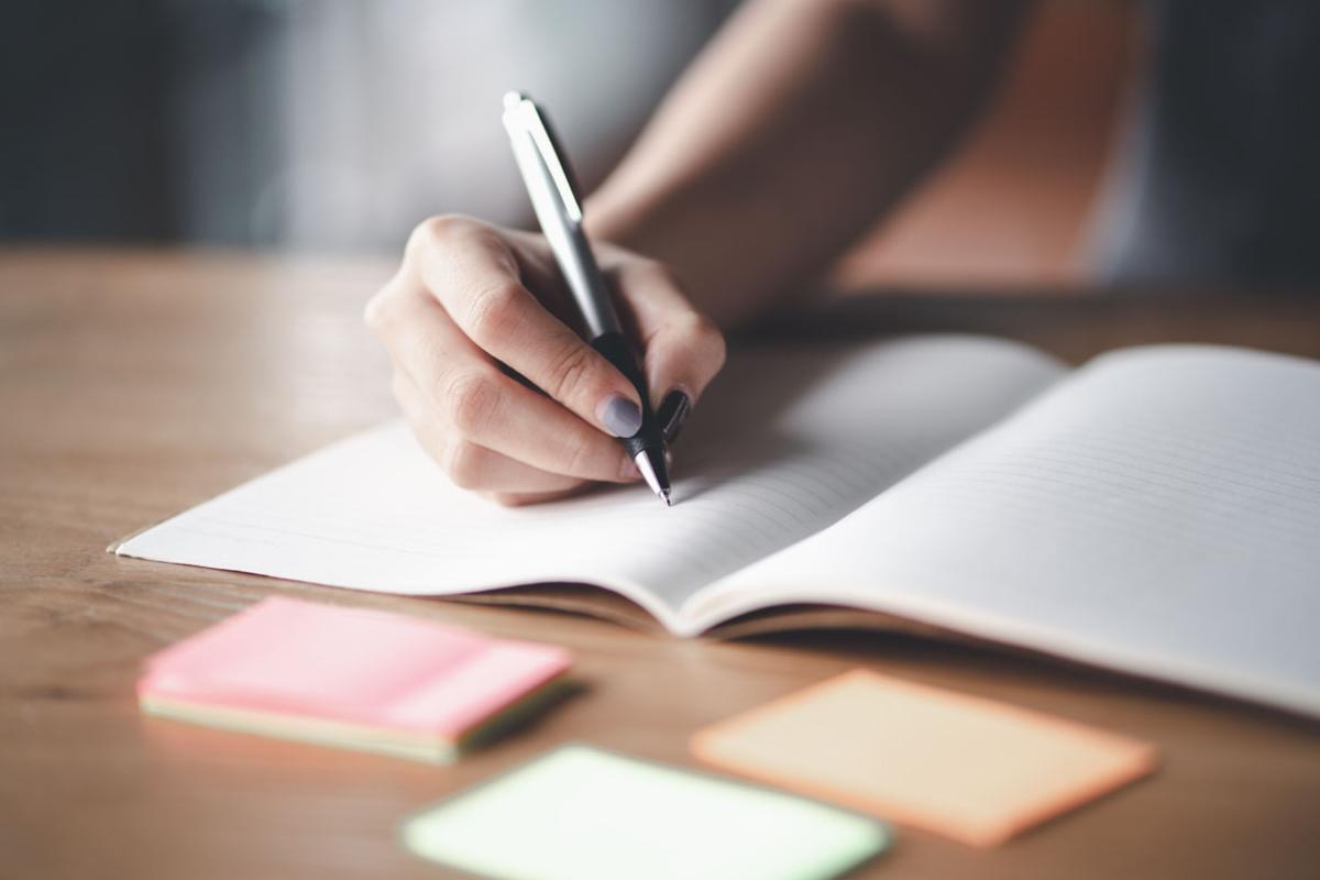 Hand writing in notebook