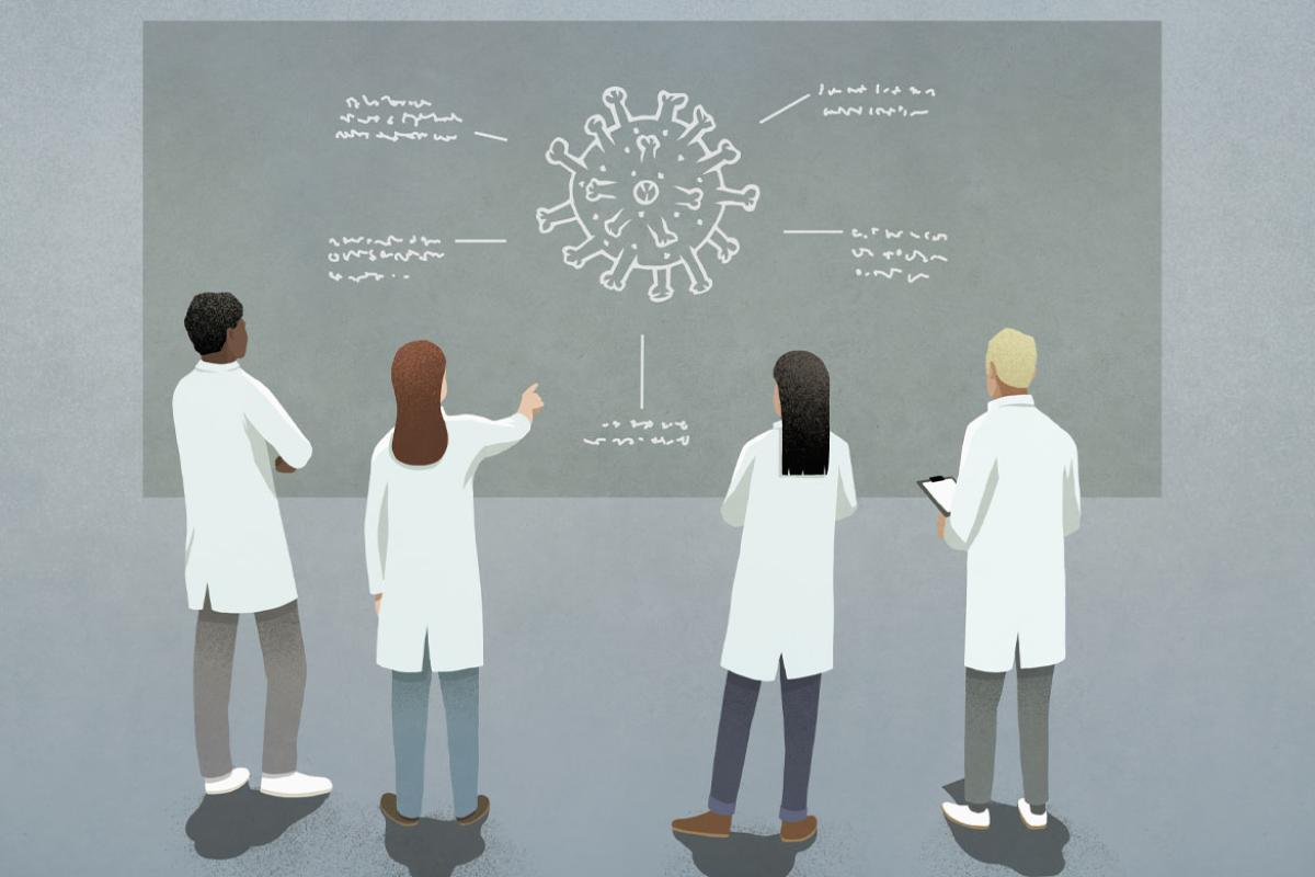 Health care workers discussing COVID-19 diagram 