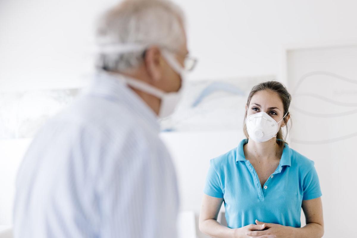 Health care worker and patient.