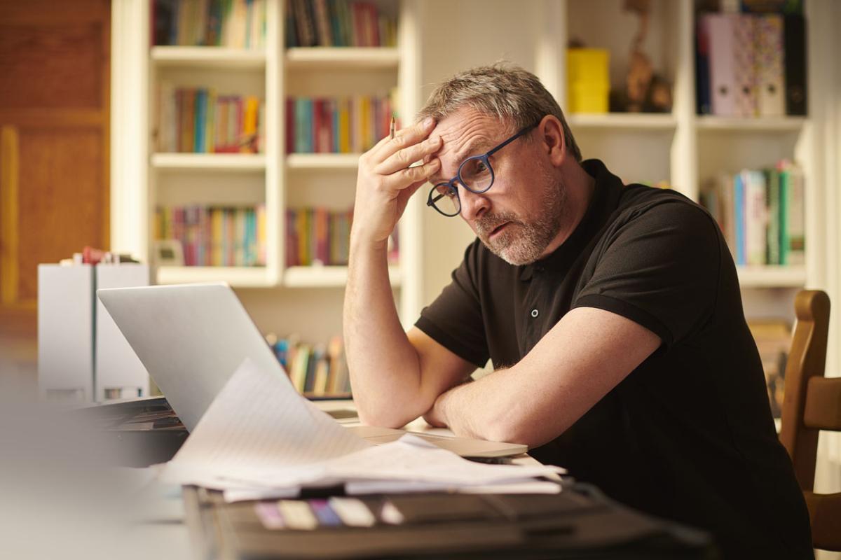 Person working in front of a laptop