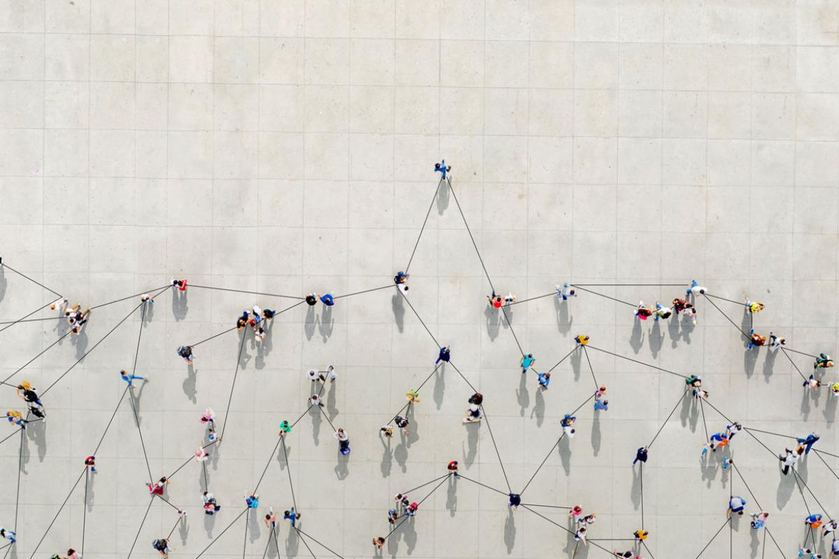 Crowd from above forming a growth graph