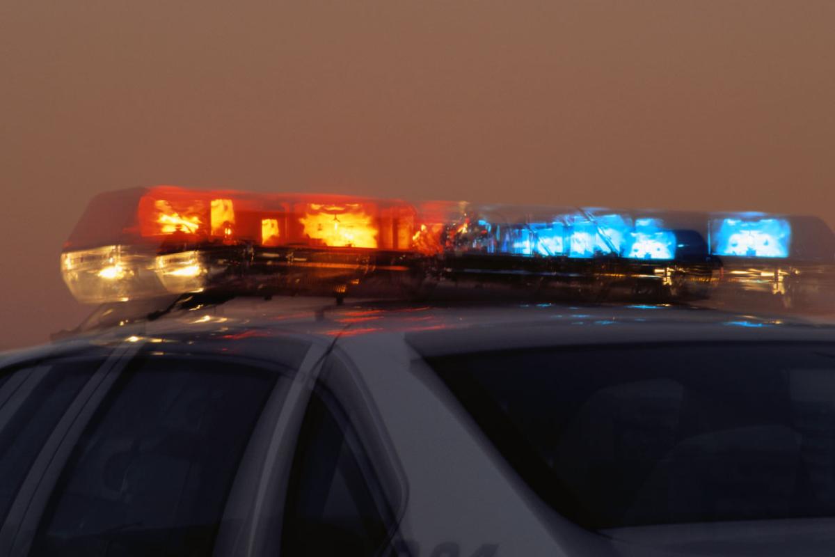 Flashing lights on top of police car-Tight shot