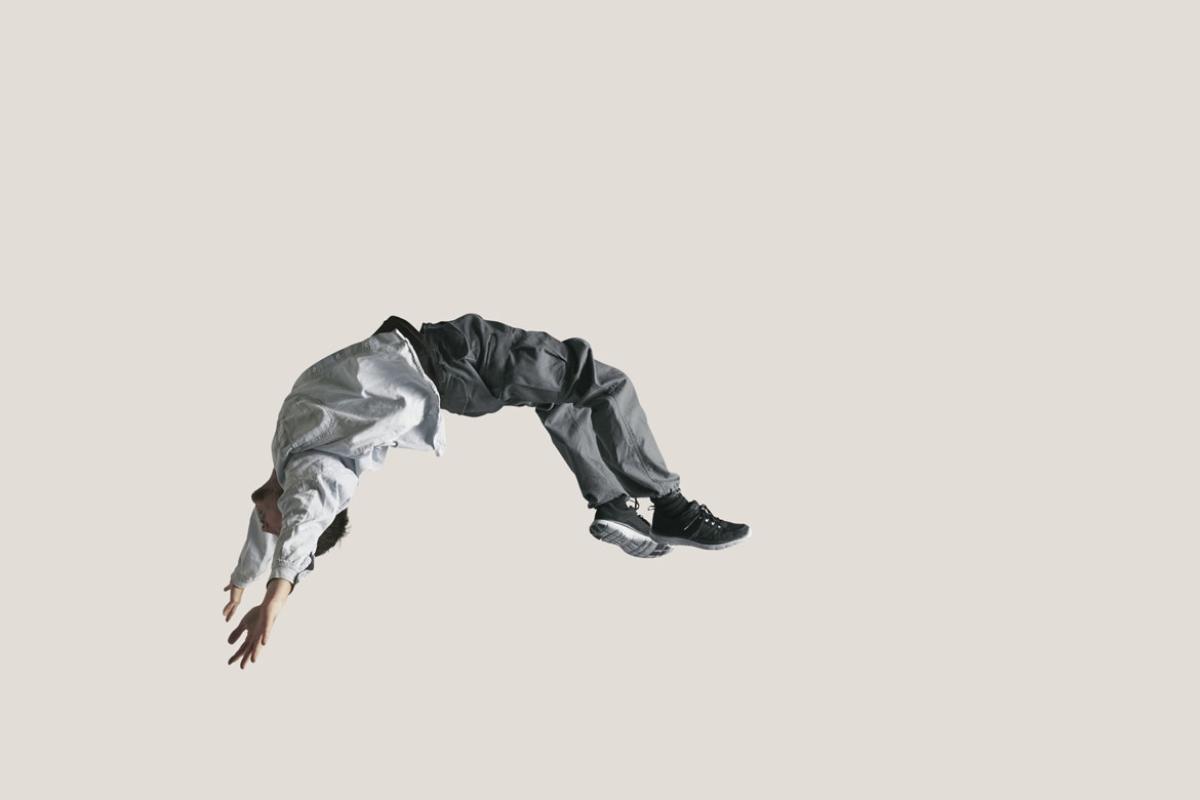 Man doing somersault in the air