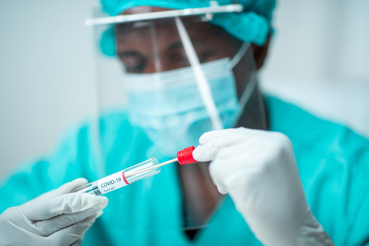 Doctor performing a COVID-19 test