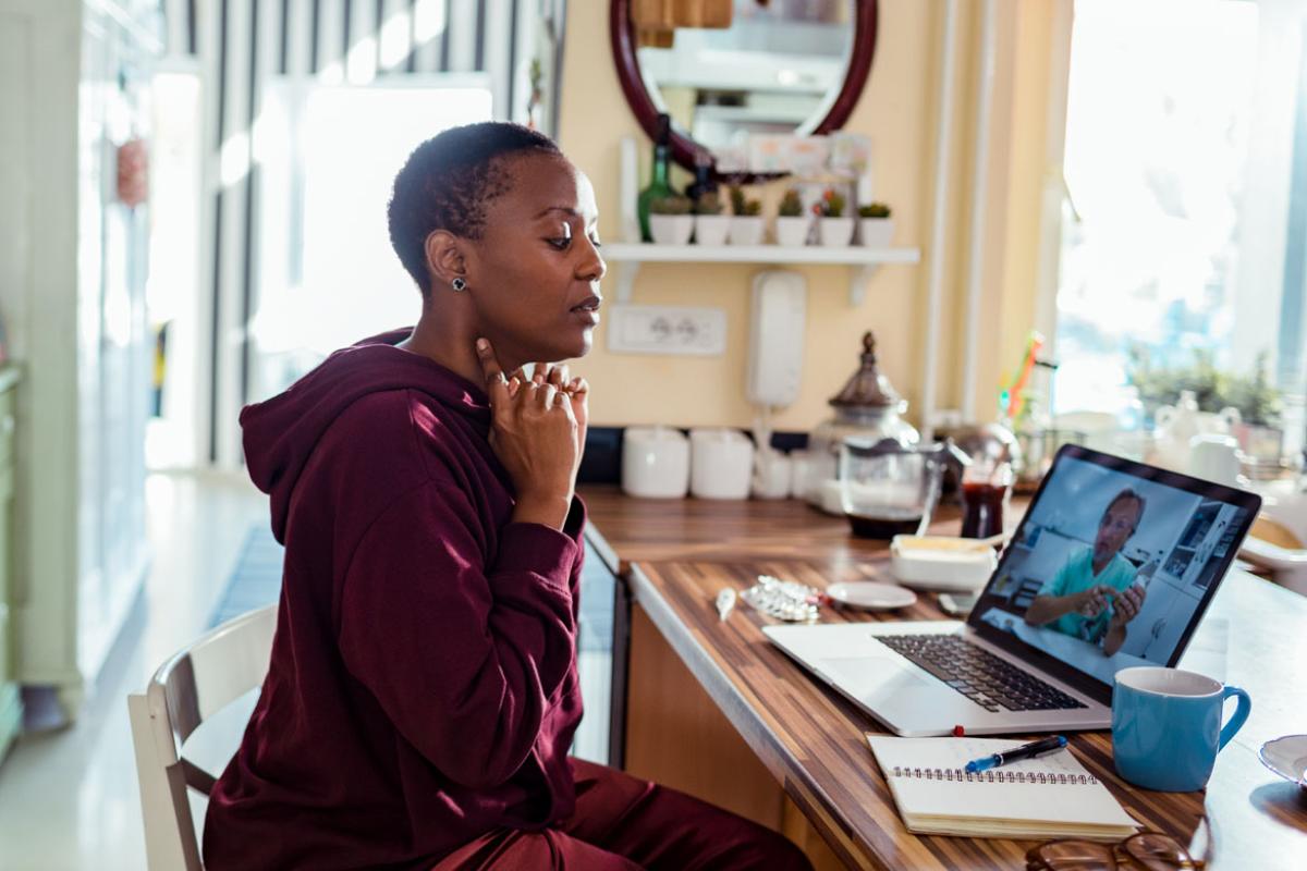Person consulting with their physician online 