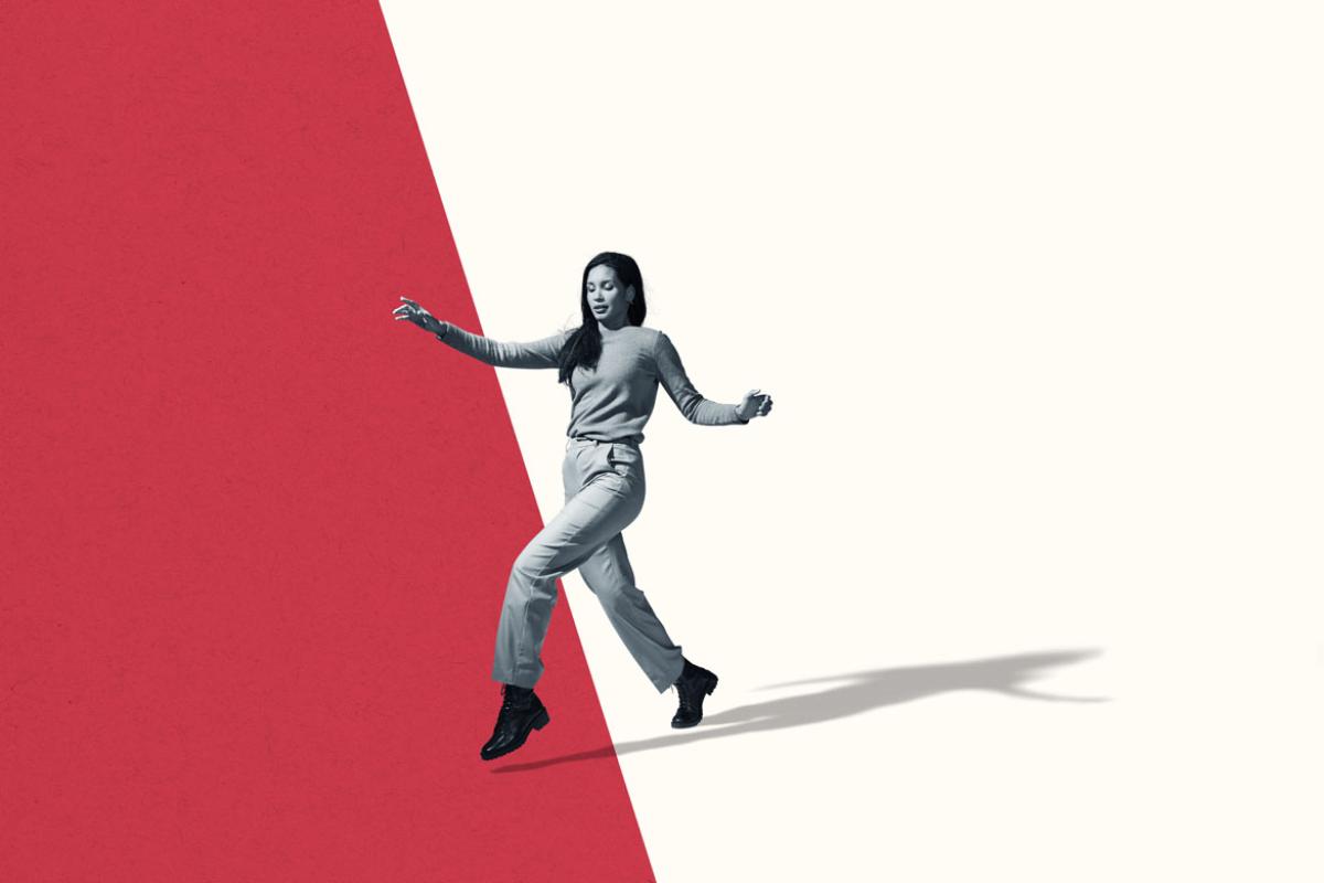 Person walking across two separate color grids
