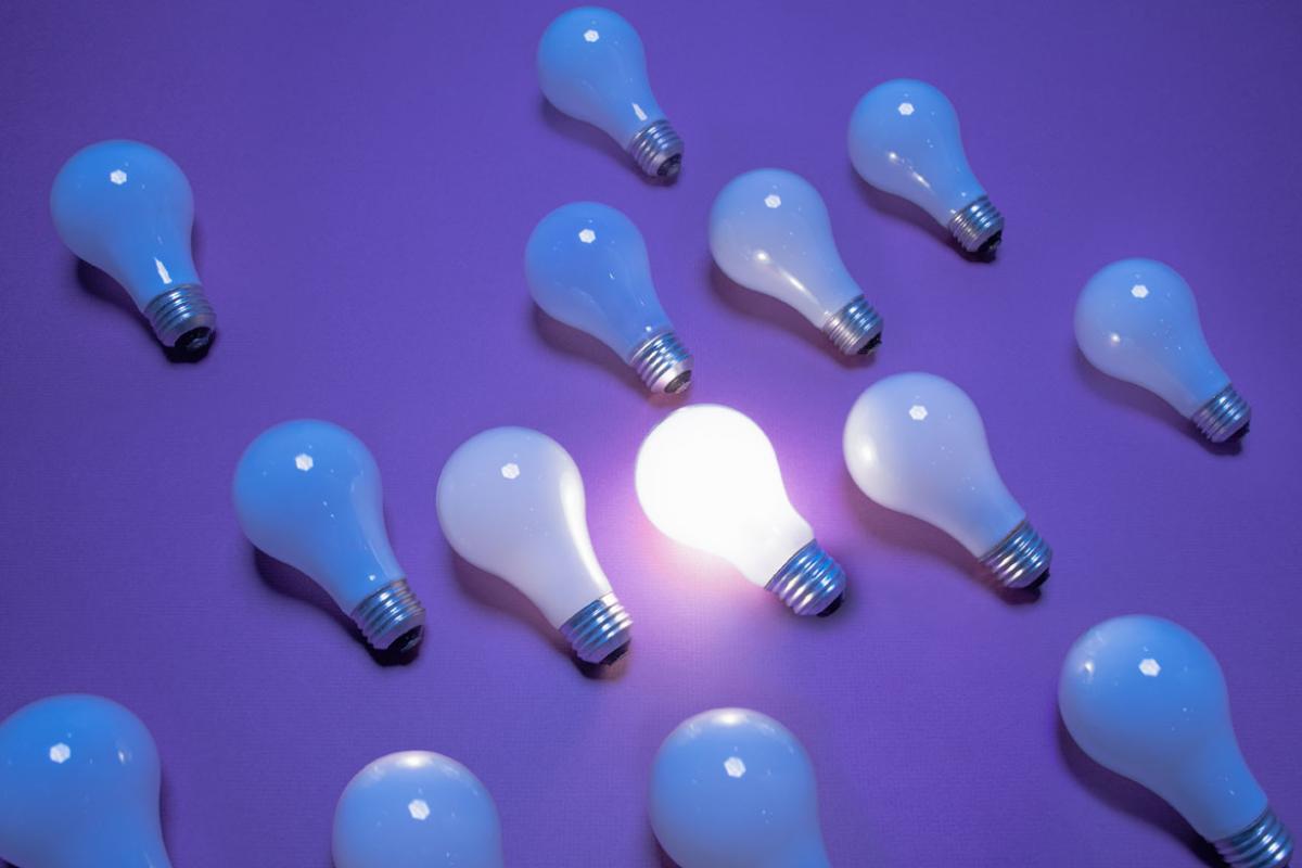 One lit lightbulb