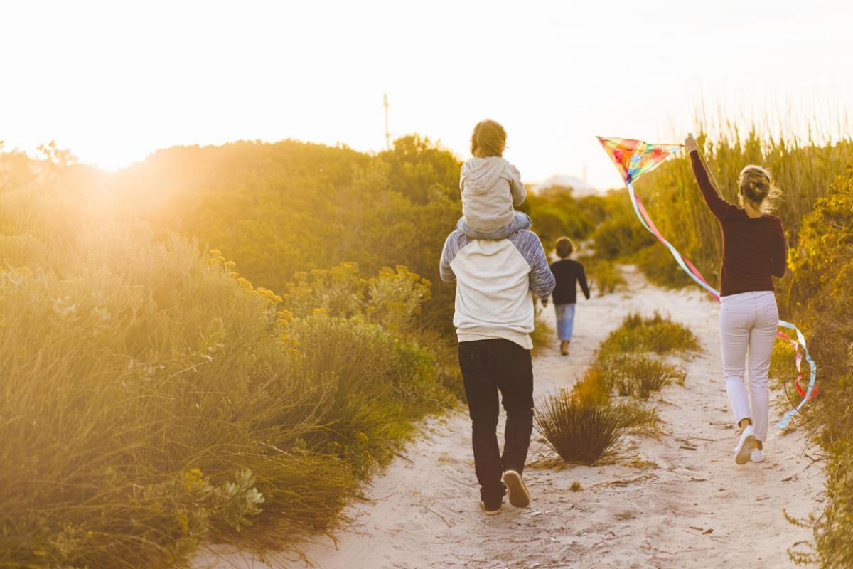 Family walking on a beach