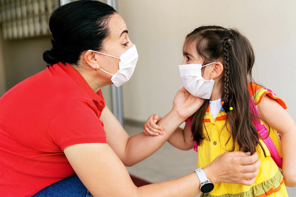 Mother and child speaking with one another