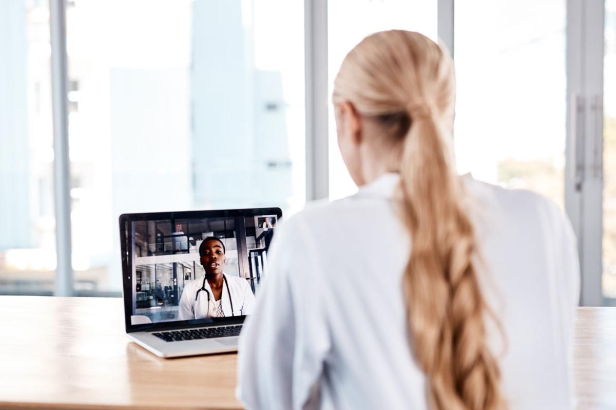 Patient and physician in a telehealth appointment