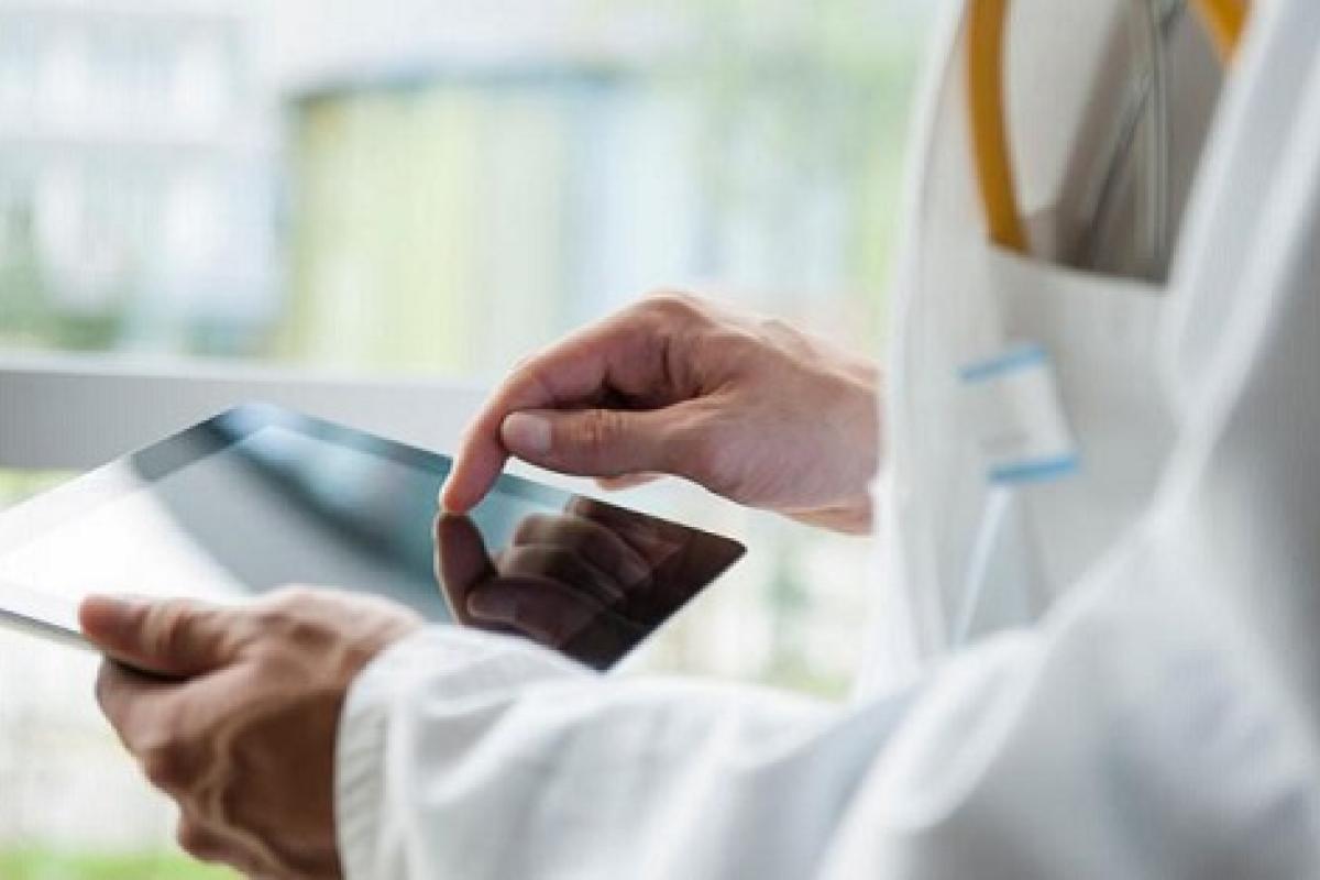 Physician with tablet