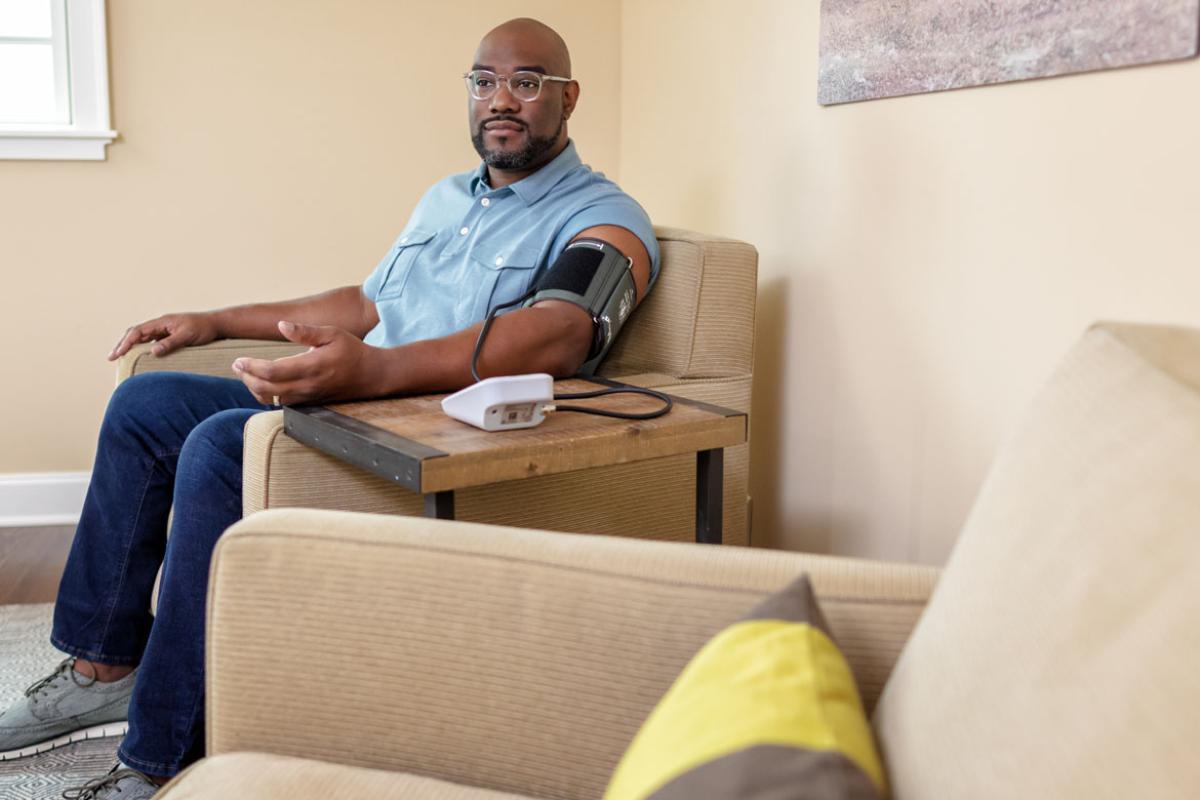 Person monitoring blood pressure