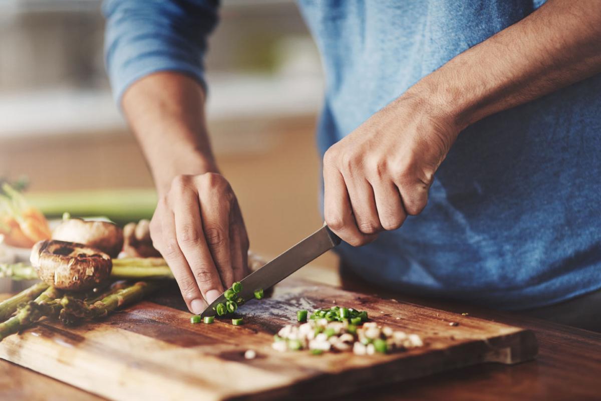 Person chopping vegetables