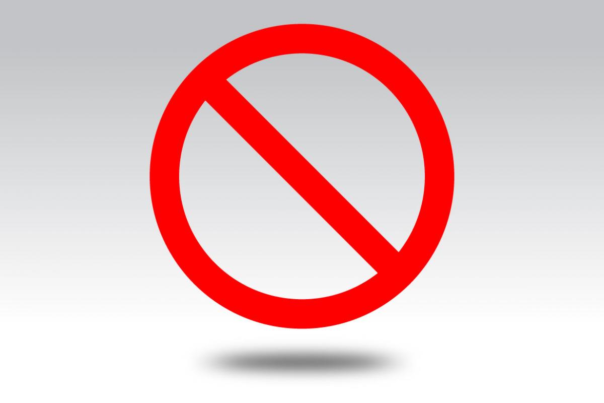 Illustration of red circle with a red line indicating “no” inside it
