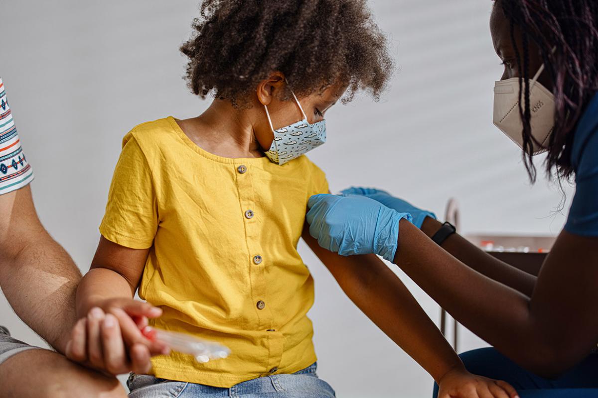 Child receiving a vaccine