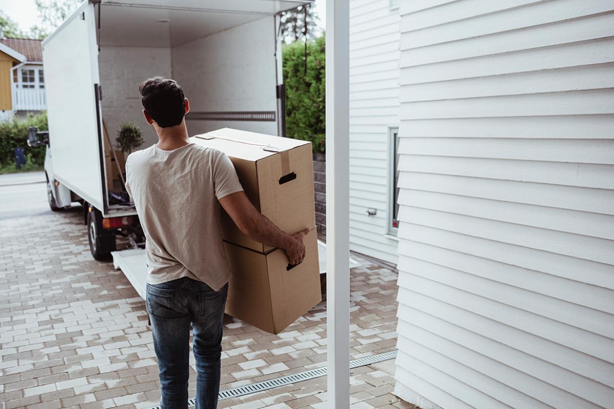 Person holding moving box