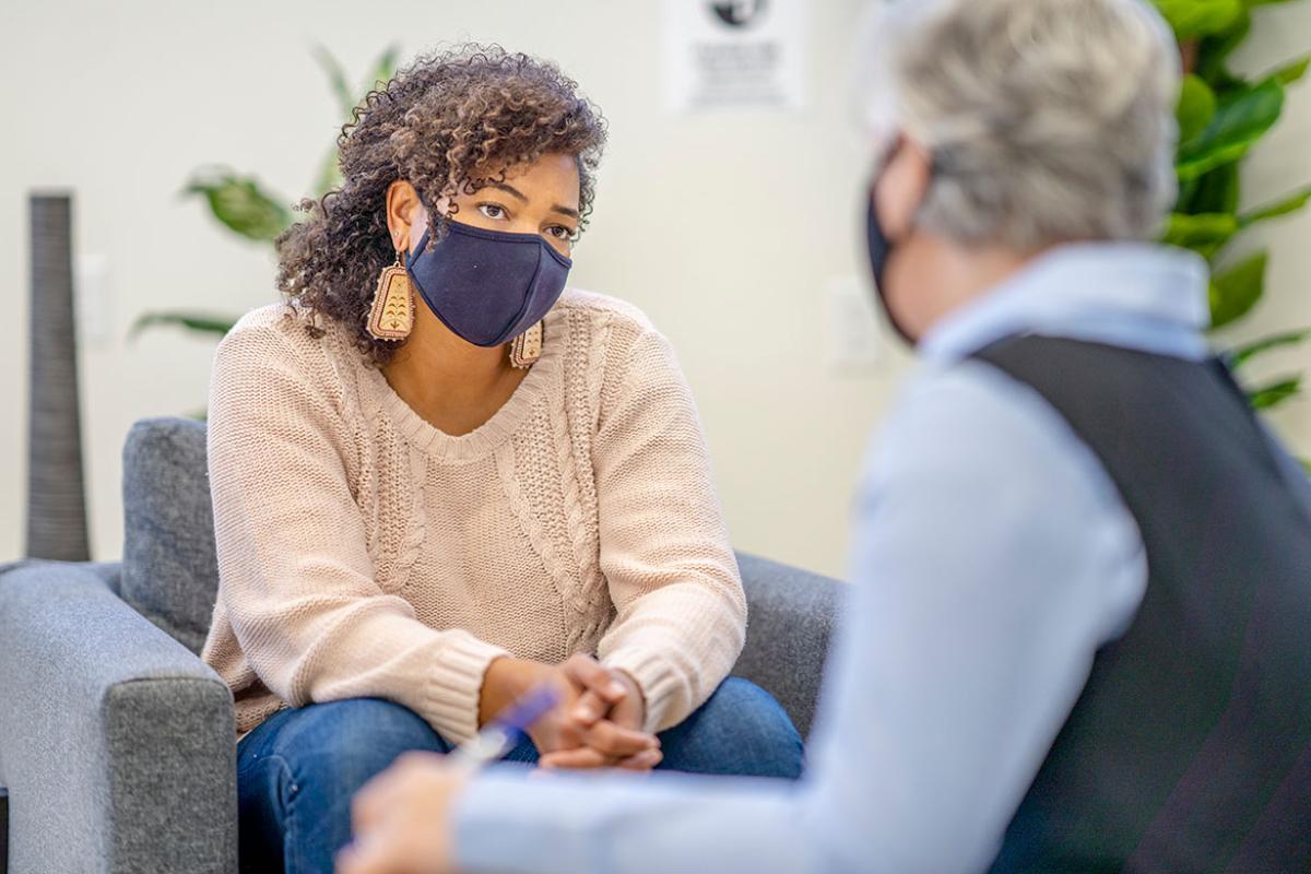 Patient and health care professional in conversation