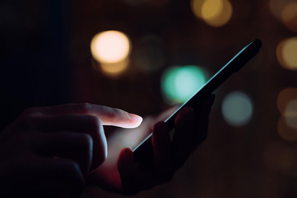 Hand holding a smartphone