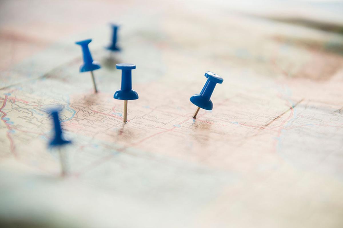Pushpins on a map