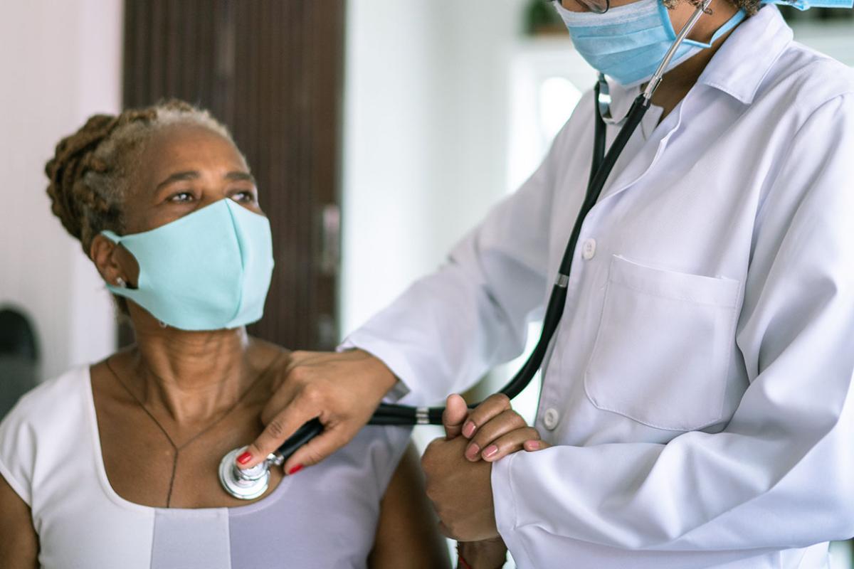 Physician examining patient