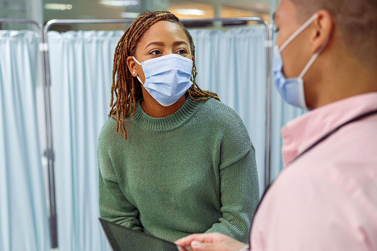 Patient speaking with physician