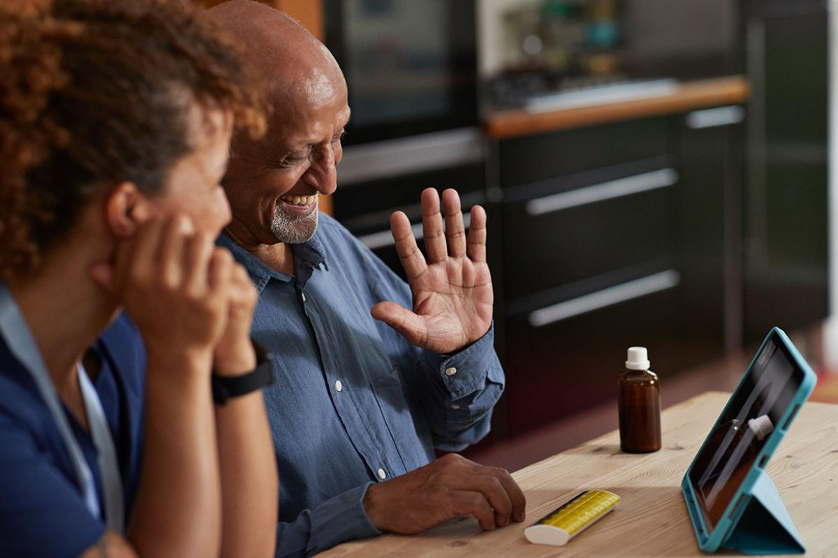 Smiling patient in a telehealth appointment