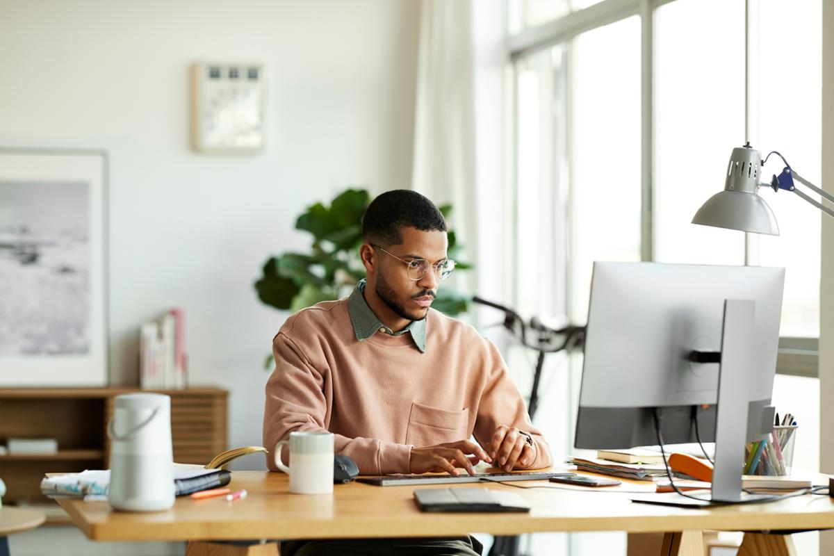Person working at a desktop computer