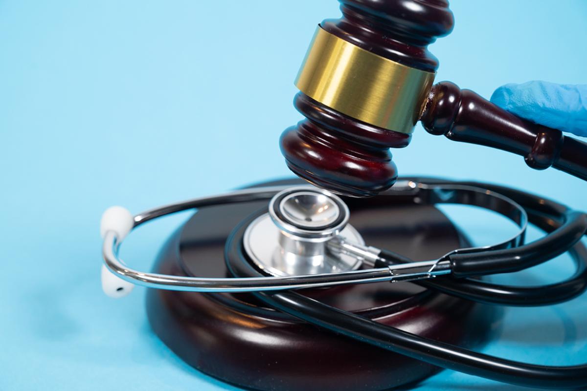 Judge's gavel and a phonendoscope