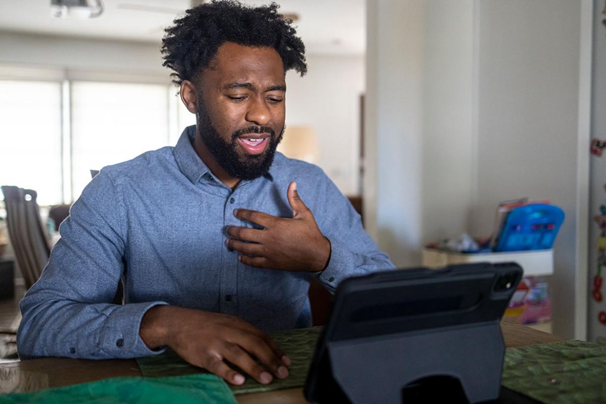 Health care worker using a tablet
