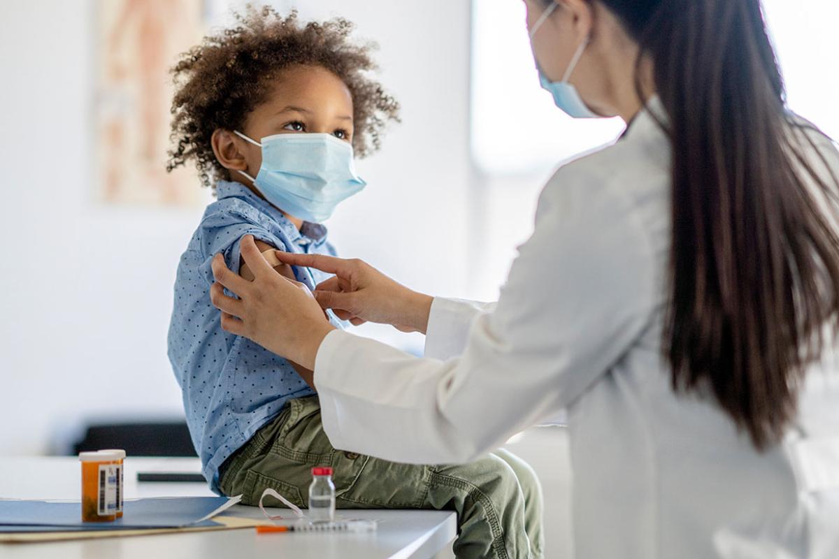 Smiling child after receiving vaccine