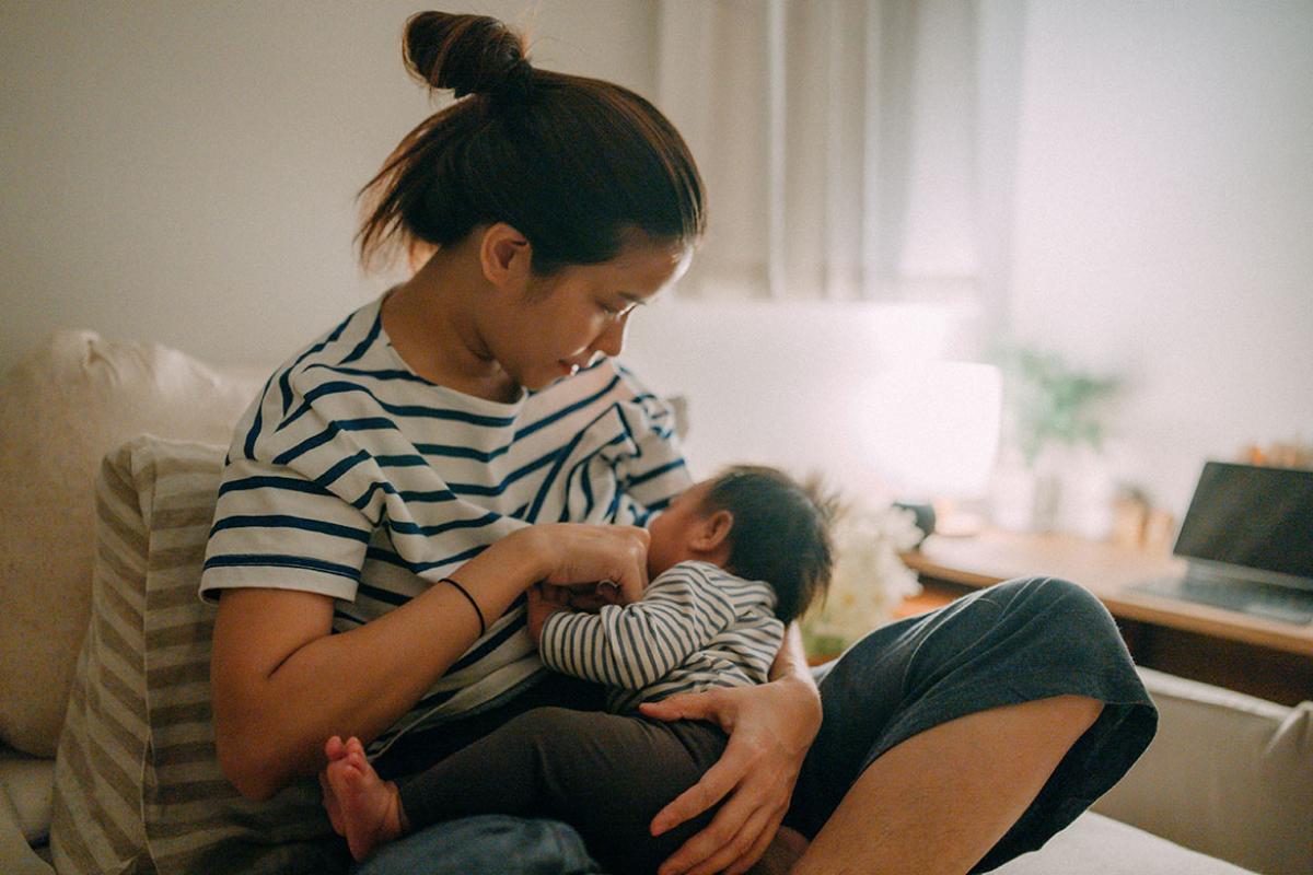 Mother breastfeeding baby