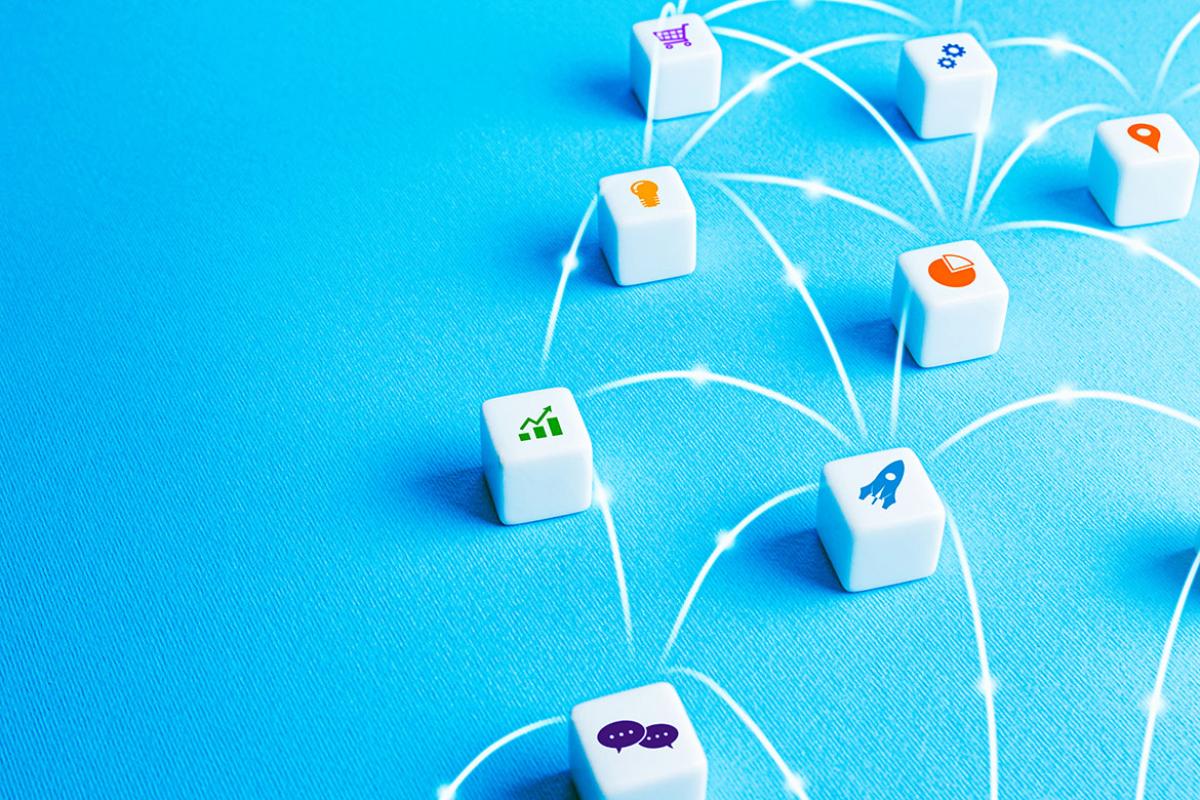 Business components connected by lines with miniature cubes