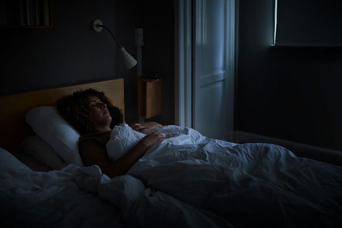 Person asleep in bed