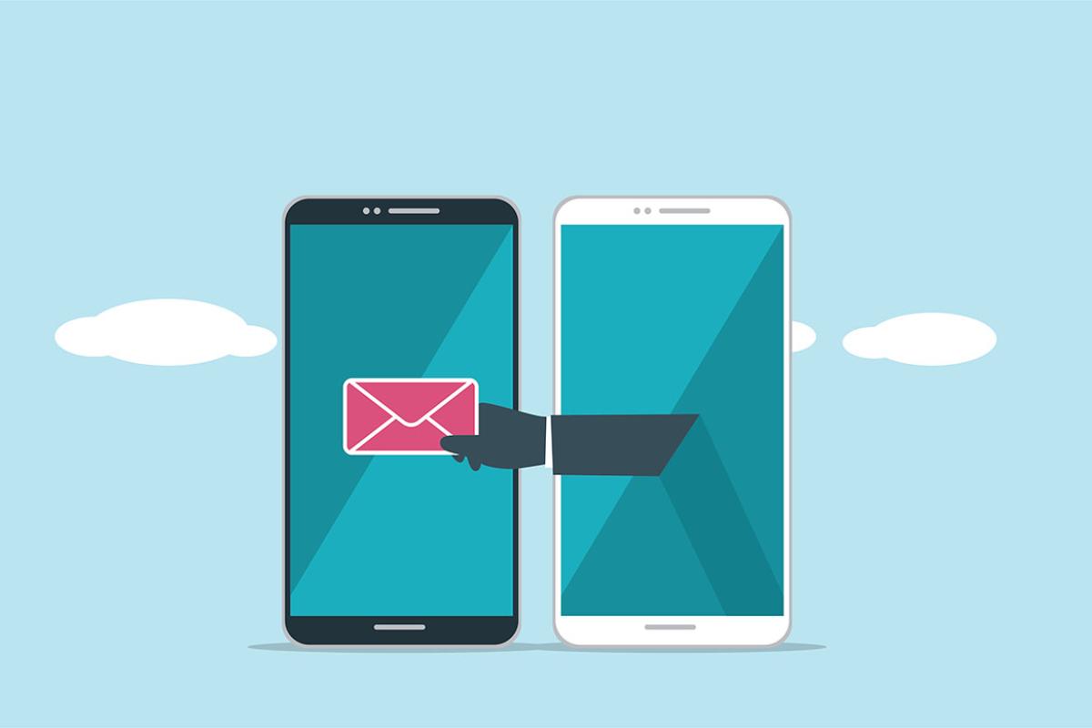 Hand reaching from one smartphone to another