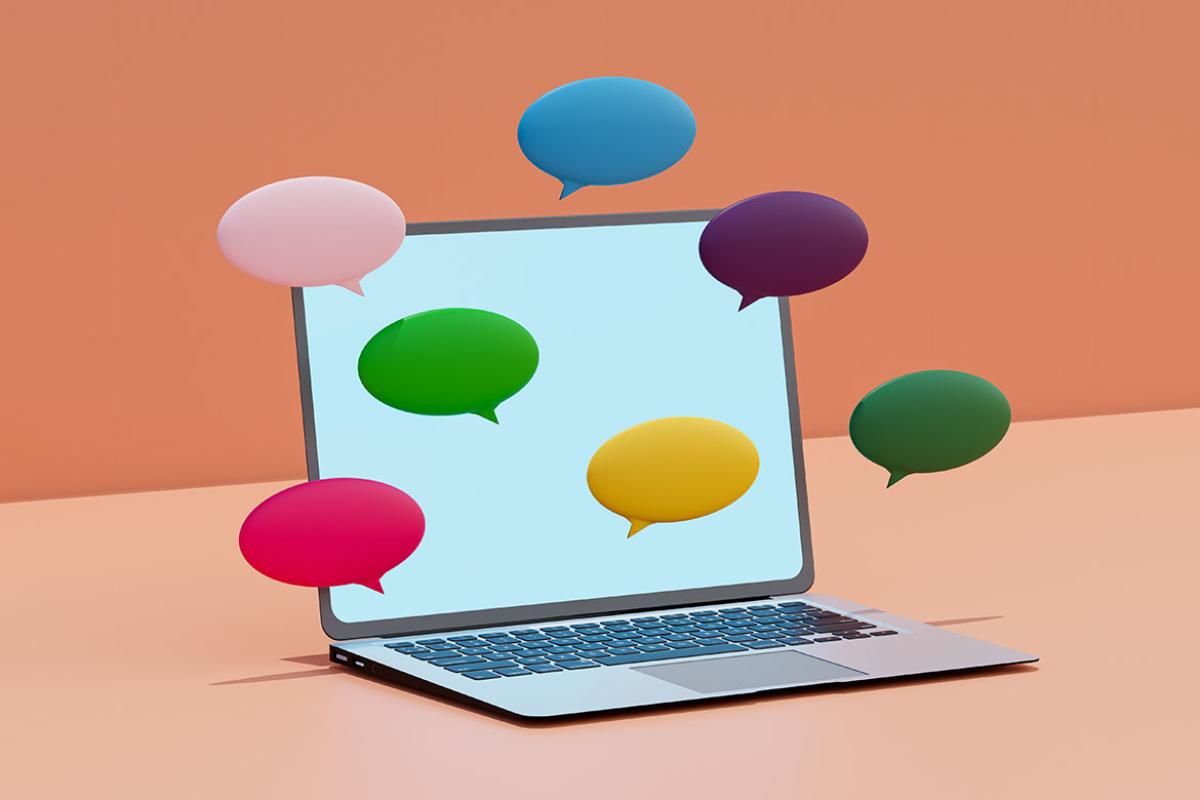 Laptop with speech bubbles