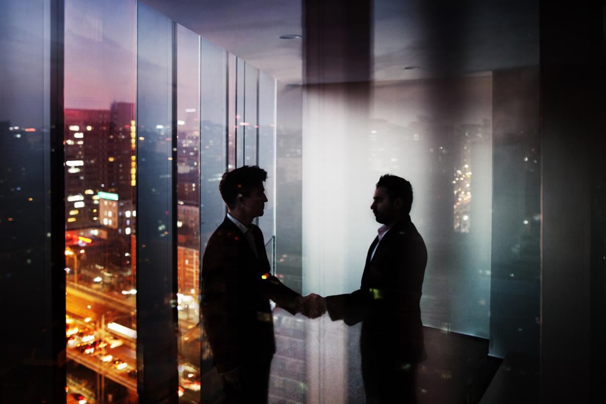 Two people shaking hands