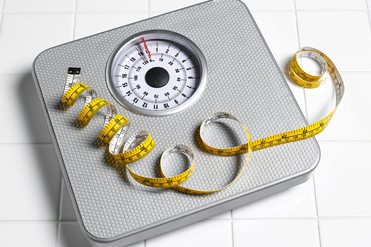 Bathroom scale and measuring tape