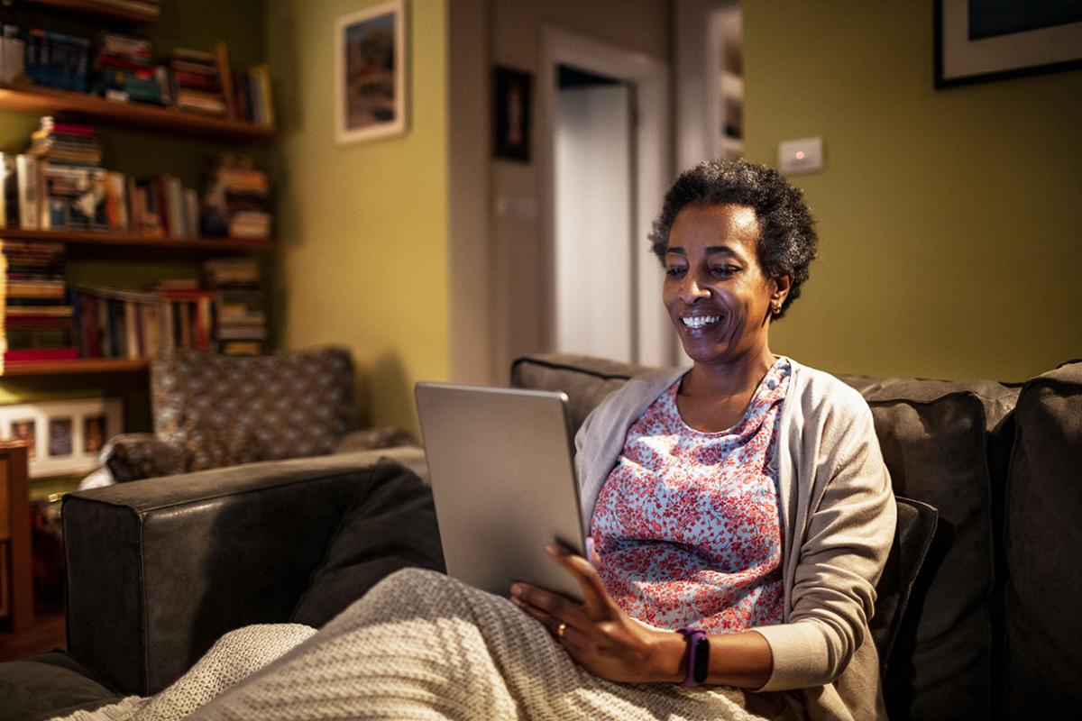 Person at home with blood pressure monitor