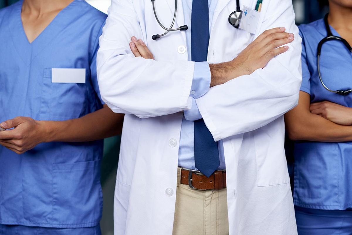 Midsections of a group of health care workers