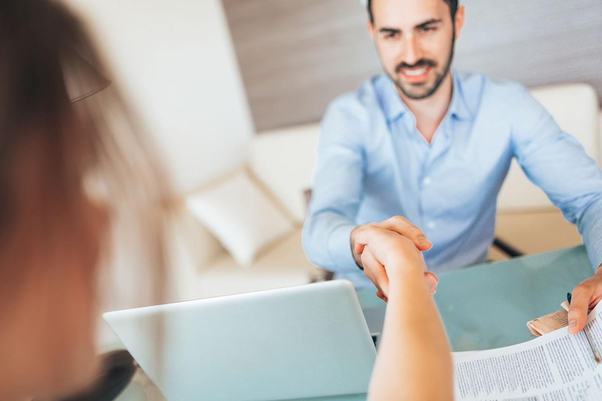 Two people shaking hands