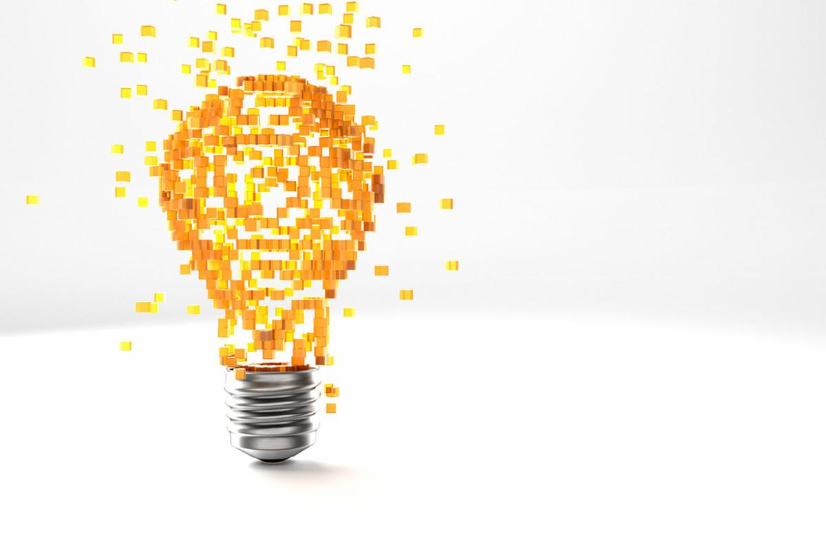 Light bulb emitting glowing cubes