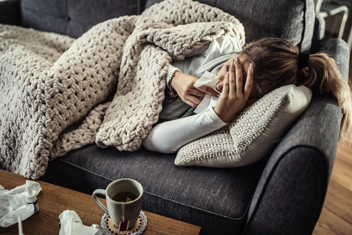 Sick person on a couch